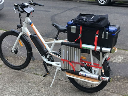 Sunride electric bike outfitted for work