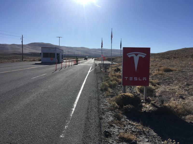 Gated entry to the Tesla Gigafactory.