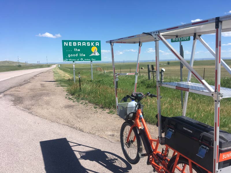 The “Welcome to Nebraska” sign says, “the good life.” It looks that way to me.