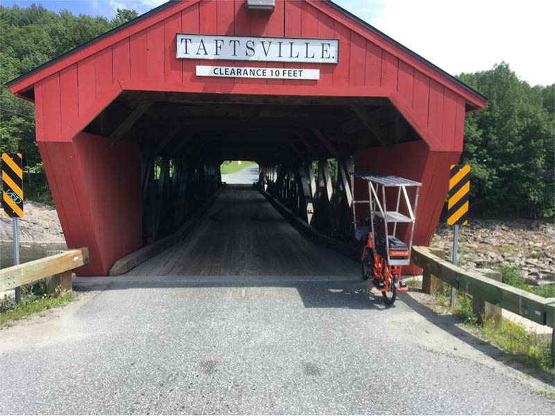 Sunride waits to cross the single lane covered bridge at Taftsville